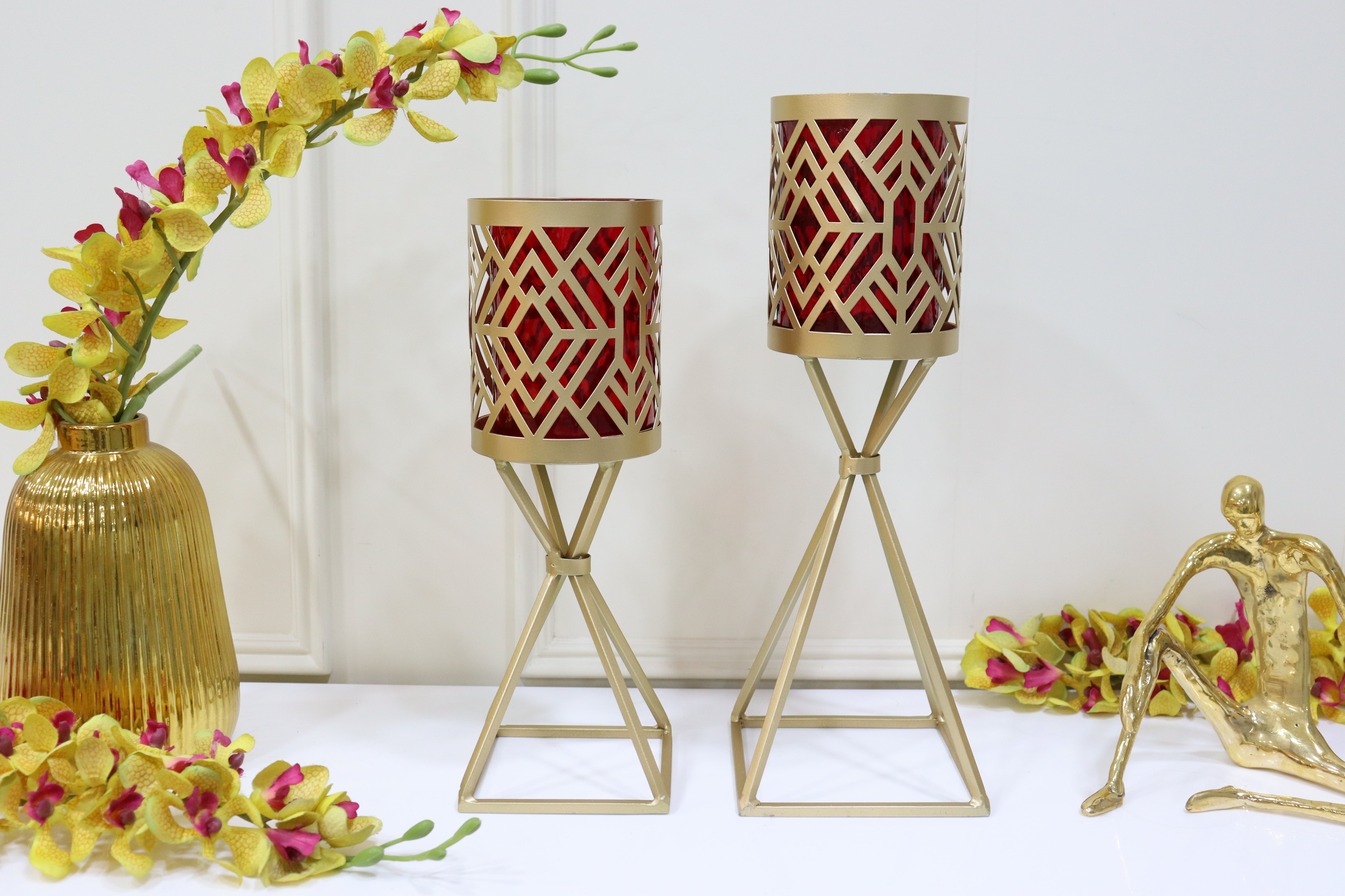 Geometric pattern set of 2 candle holders with red glass
